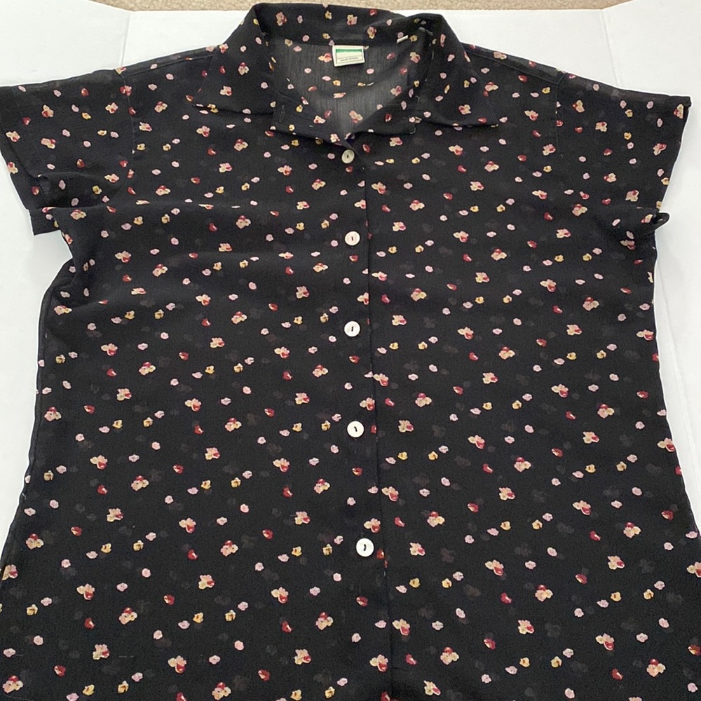 United Colors of Benetton sheer floral blouse.